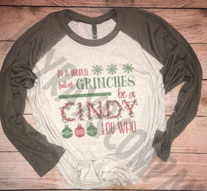 In a world full of grinches be a Cindy Lou Who Raglan