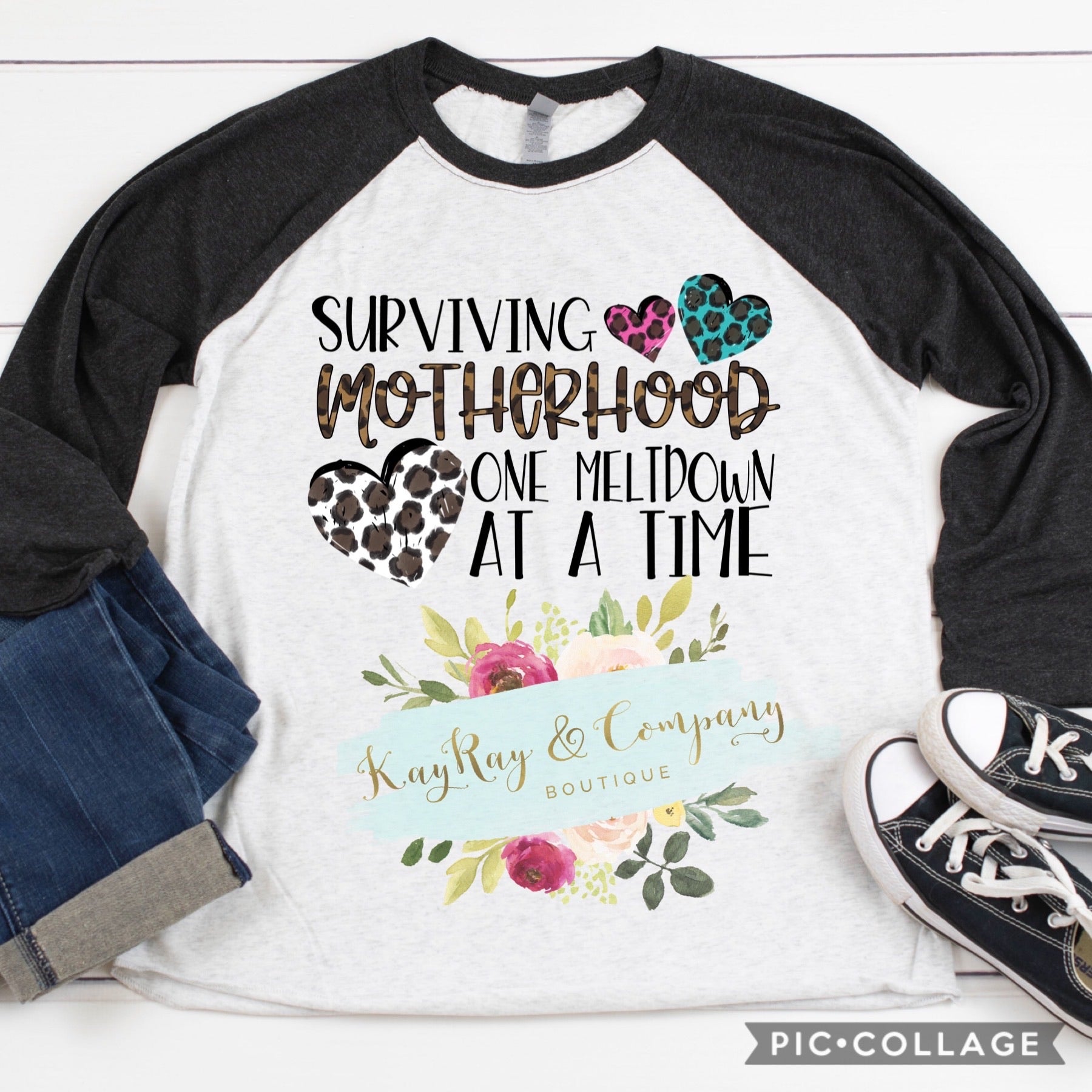 Surviving motherhood one meltdown at a time Raglan T-shirt
